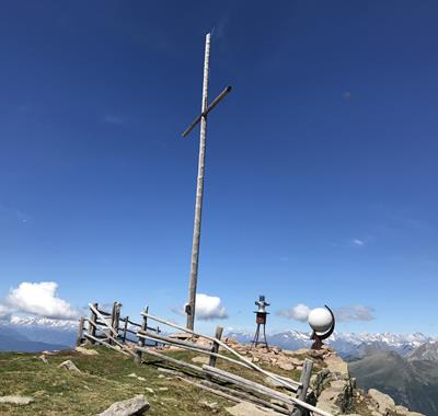 Stone globe on the summit of the Villandro Mountain